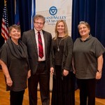 Speakers pose for a photo